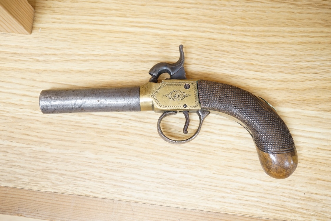 A boxlock percussion pocket pistol with turn off barrel, Birmingham proofs, engraved brass frame, and chequered rounded walnut grip